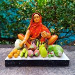 indian artisan hand making handicrafts clay doll